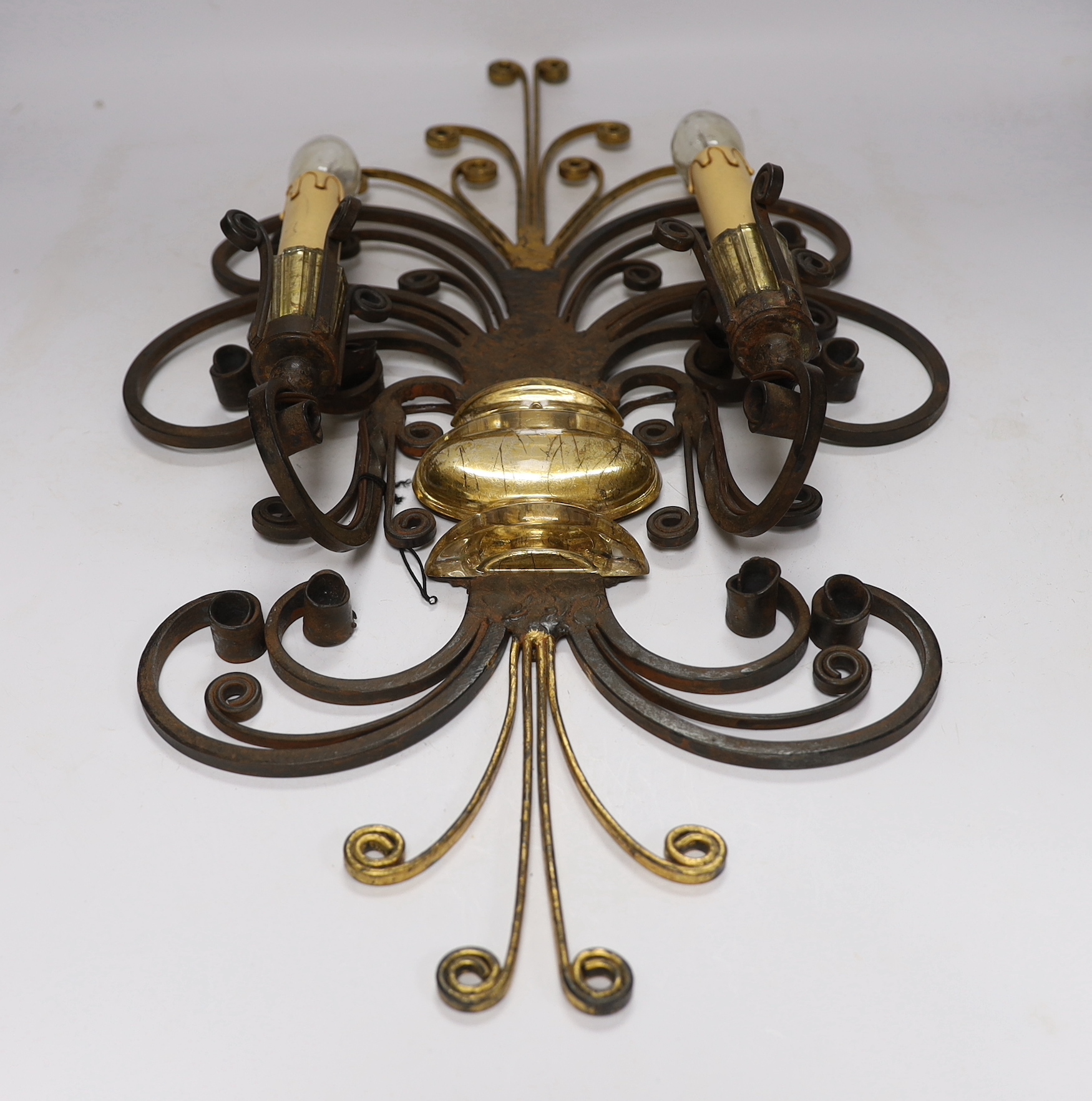 A Maison Bagues wrought iron and glass wall light, 50cm high